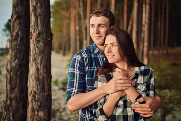 Happy couple. Loving couple enjoying in moments of happiness in the park. Love and tenderness, dating, romance.