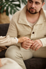 family with a child at a psychotherapist at the reception