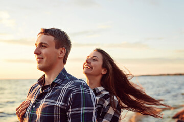 Young couple having fun on a coast