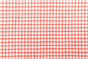 Kitchen cotton tablecloth or napkin with a pattern of red squares on a white background.