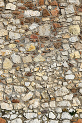 Old wall texture of various stones