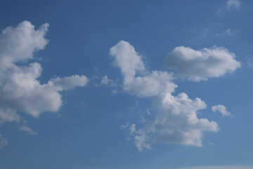 Clouds on a blue background with white clouds.