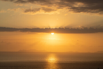 Sunset over the landscape of Santorini island in Greece.