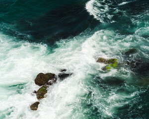 wave breaking on the rocks