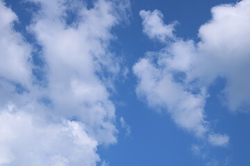 Clouds on a blue background with white clouds.