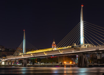 Fototapeta na wymiar Metro bridge across the Golden Horn at night, Istanbul, Turkey