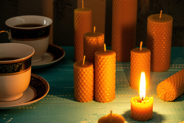 Decorative Easter candles made of beeswax with a honey aroma for interior and tradition burning on the table.