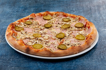 fresh pizza on the white plate