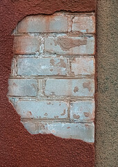 Cement wall with part of brick background inside