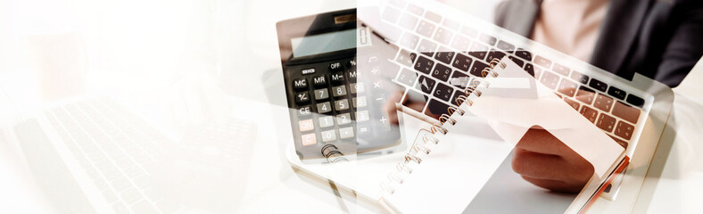 Businesswoman use laptop ,analytics and financial and bank technology concept, chart from computer...