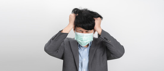 Depress and Serious Businessman wearing an anti virus protection mask to prevent others from corona COVID-19 and SARS cov 2 infection. Protection versus viruses and infection