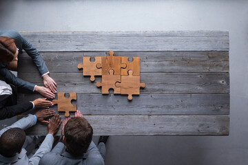 Business teamwork with puzzle