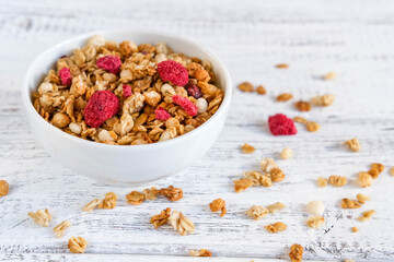 A bowl of whole grain muesli. Homemade granola. Sprinkled muesli