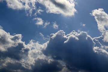 White clouds on a blue sky for background and design