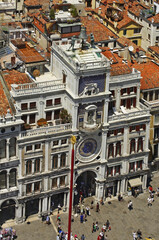 Clock tower of St. Mark at square of St. Mark in Venice. Region Veneto. Italy