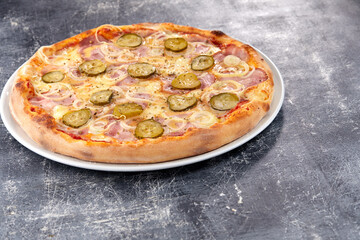 fresh pizza on the white plate