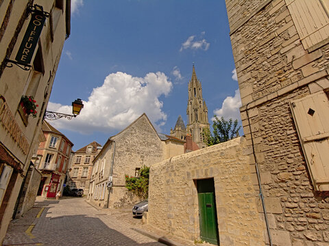 Cosy cobblestone street with old houses in Senlis, France