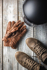 Safety motorcycle accessories. Leather gloves, helmet and shoes