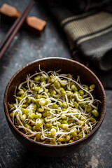 Sprouted green mung beans. Mung sprouts in bowl.