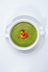 green cream soup on the white