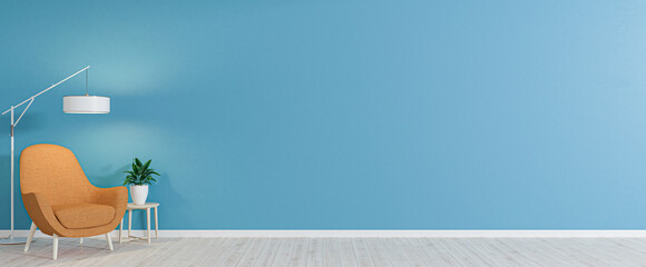 Empty room with armchair on empty blue wall background. Modern minimalist interior with armchair, plant, table and a lamp. 3d rendering.