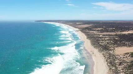 2020 - Excellent aerial shot of waves lapping Back Beach on Streaky Bay of South Australia's Eyre Peninsula.