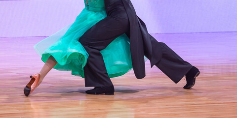 Woman and man dancing standard program. International competition.