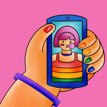 Detalle de mujer adolescente LGTBQ de cabello rosa tomándose un selfie con su teléfono