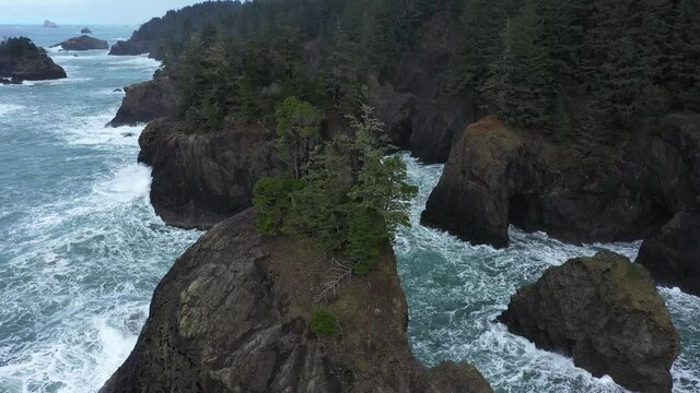 2020 - Excellent aerial shot of water cresting on coves of the Oregon coast.
