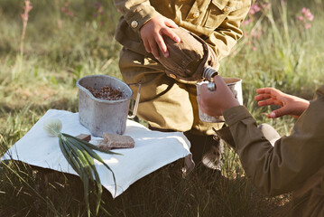 Military food with porridge and tea. Soldiers porridge. 9 may holiday. Victory Day. Children's...
