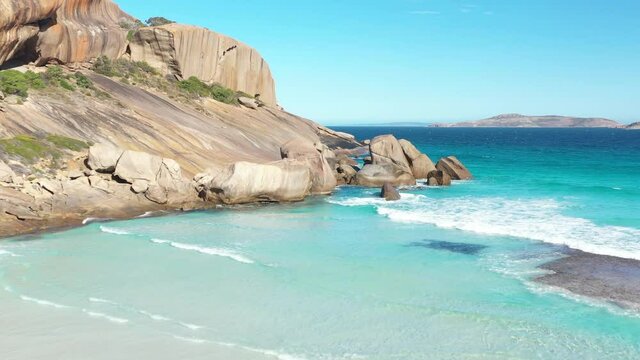 2020 - Waves of clear blue water lap the shores of West Beach in Esperance, Australia.