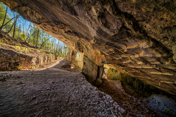 Beautiful Limestone cave, Old Oolitic stone quarries in Massone, The extracted stone, called 