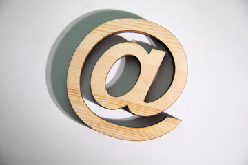 wooden email sign on the white background