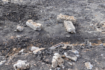 the ruins of the city-metal and wood and debris