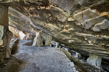 Beautiful Limestone cave, Old Oolitic stone quarries in Massone, The extracted stone, called 
