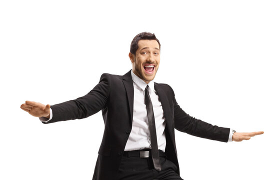 Excited businessman gesturing with hands and smiling at the camera