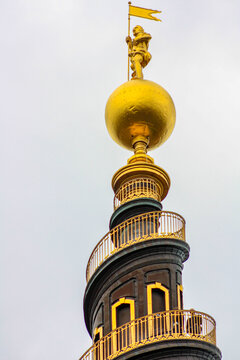 The top of the tower of the Vor Frelsers Kirke, with the characteristic spiral staircase and the golden statue at the top