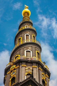 The top of the tower of the Vor Frelsers Kirke, with the characteristic spiral staircase and the golden statue at the top