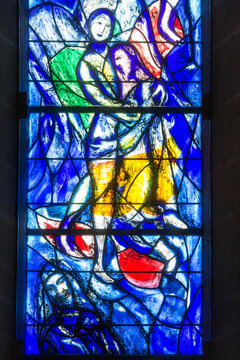 Zurich, Switzerland - April 19. 2021 : Details of the stained glass window of the Protestant church Fraumunster designed by Marc Chagall