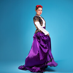 A young woman in an ethnic outfit, Spanish or Mexican style,