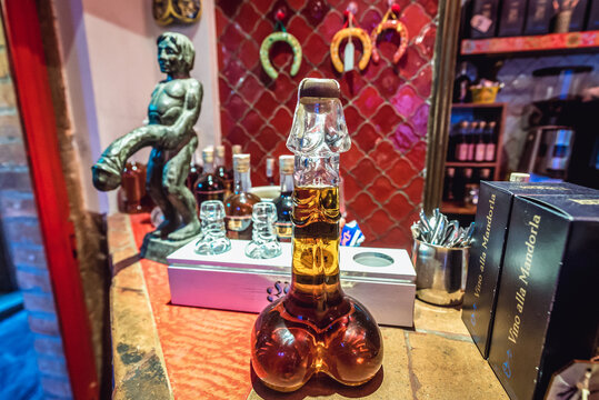 Castelmola, Italy - May 4, 2019: Penis-shaped bottle in famous Turrisi bar in Castelmola town on Sicily Island