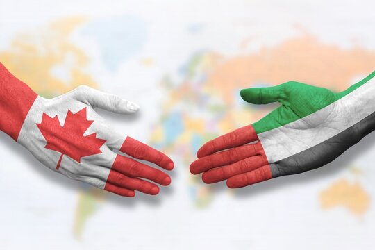 Canada and United Arab Emirates - Flag handshake symbolizing partnership and cooperation