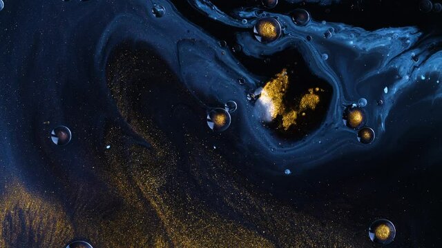 Beautiful oil colors of the universe. Bright colored bubbles sparkling. Abstract Acrylic Liquid Painting Texture. Macro Background Wallpaper. Oil Ink Acrylic Paint Spread Blast Explode Galaxy 
