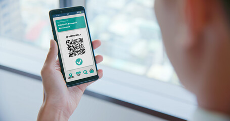 buisnessman shows health passport