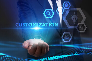 Business, Technology, Internet and network concept. Young businessman working on a virtual screen of the future and sees the inscription: Customization