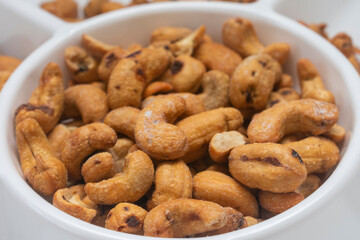 close up of bowl of cachew chestnuts, nuts