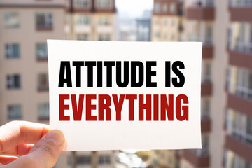 Text sign showing ATTITUDE IS EVERYTHING 