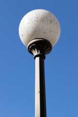 Beautiful white street lamp against a beautiful blue sky in a Sydney Park NSW Australia
