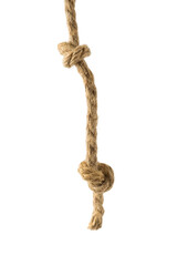 Thick twisted rope with two large knots isolated on a white background.