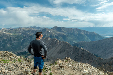 Hiker on top of LaPlata Peak